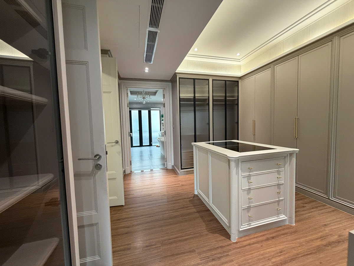 Walk in closet at master bedroom